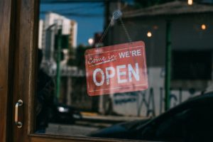 Vintage "We're Open" sign.