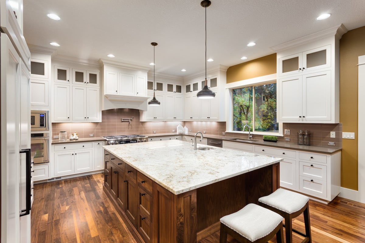 Luxury kitchen with a white marble island.