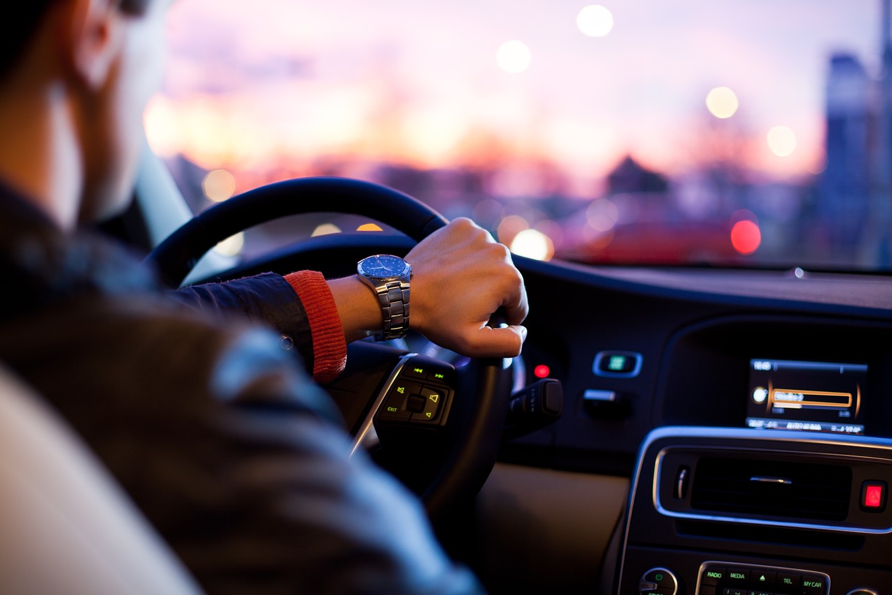 A man driving in a car.