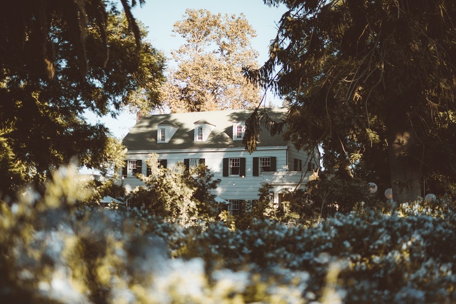 A house surrounded by trees.