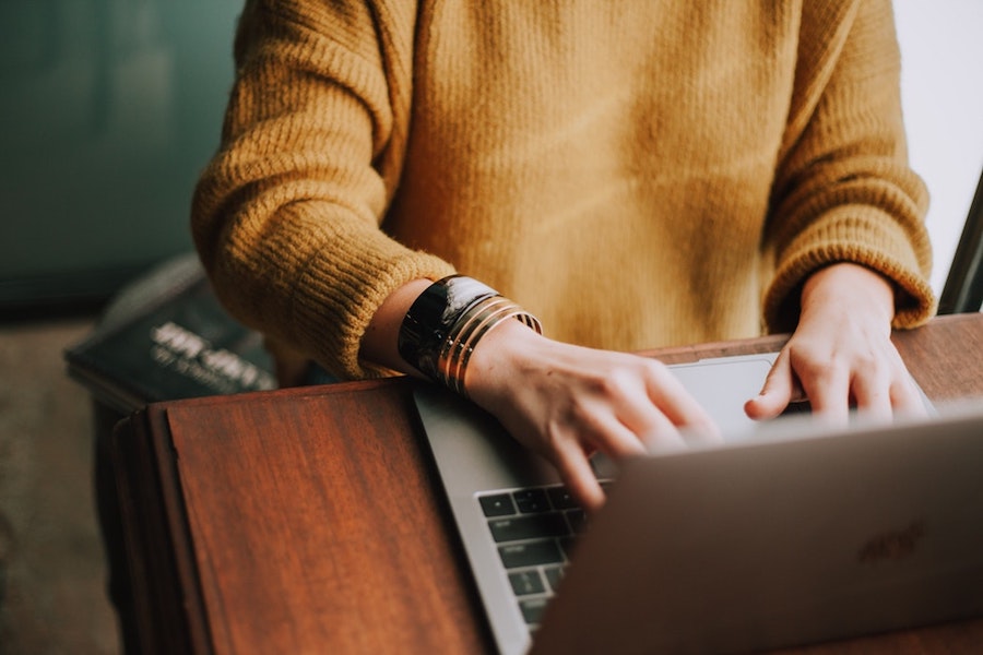 A woman on her laptop.