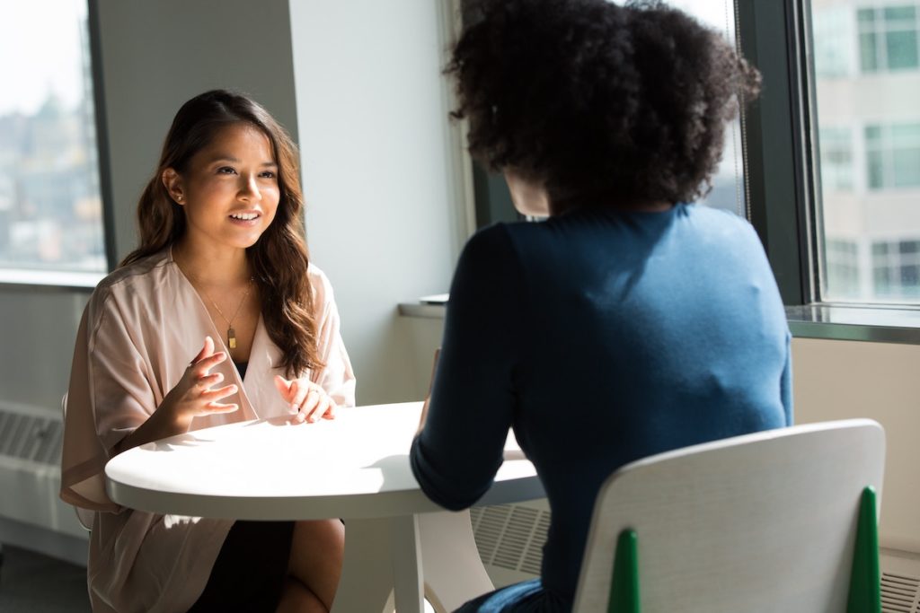 Agent and client talking